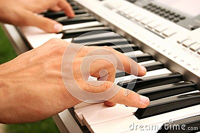 Keyboards player Stock Photo