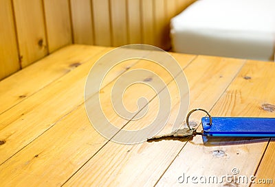 Keychain on wooden table in hotel,leave space for adding your te Stock Photo