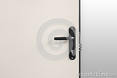 Keyhole and bolts at brown white door with black handle Stock Photo