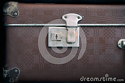 The keyhole is on an old closed suitcase. Retro-style. Stock Photo