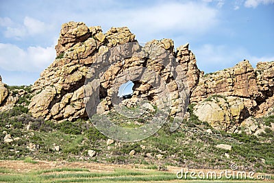 Keyhole rock formation is a landmark on the popular Devils Backbone hogback hiking trail in Loveland, CO Stock Photo