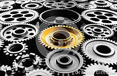 Keyman,key success or leadership concepts with metal gold cog outstanding in another cogs.Business performance Stock Photo