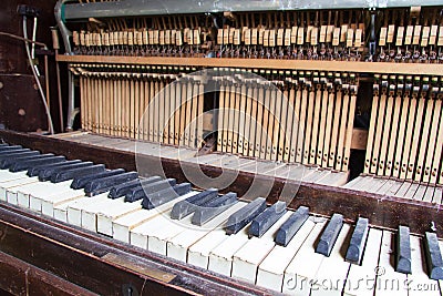 Keys from an old broken damaged piano Stock Photo