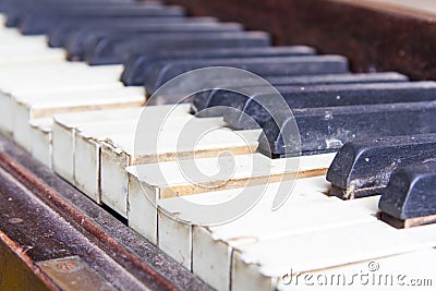 Keys from an old broken damaged piano Stock Photo