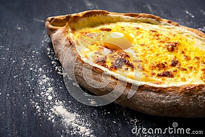 Khachapuri adjara traditional Georgian cuisine meal. Stock Photo