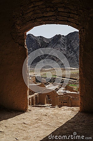 Kharanaq - Ruins of the abandoned mud brick city Stock Photo