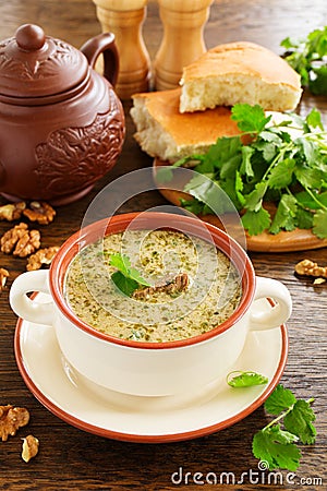 Kharcho soup of beef with walnuts and rice. Stock Photo