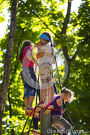 A new popular children`s attraction is an extreme spruce with flying children of adolescence. Editorial Stock Photo