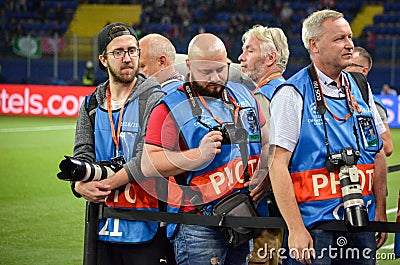 KHARKIV, UKRAINE - SEPTEMBER 19, 2018: Photojournalists and photojournalists will work during UEFA Champions League match between Editorial Stock Photo