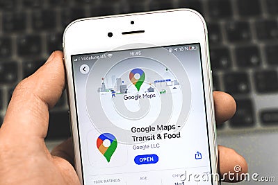 Kharkov, Ukraine - February 22, 2021: Google Maps is popular navigation mobile app, close up in man`s hand Editorial Stock Photo