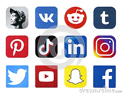 KHARKOV, UKRAINE - FEBRUARY 24, 2021: Many icons of popular social networks and messengers printed on white paper. Logos of modern Editorial Stock Photo