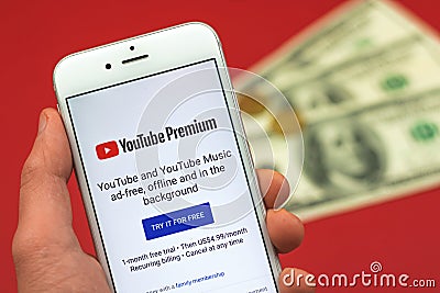 Kharkov, Ukraine - February 5, 2021: Youtube Premium screen on Apple smartphone, application and subcribe, money and business Editorial Stock Photo