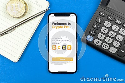 Kharkov, Ukraine - January 10, 2022: Crypto Pro application logo, title screen. Business desktop background, top view Editorial Stock Photo