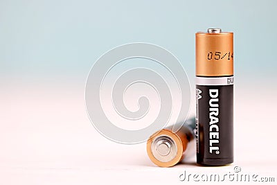 Duracell batteries on white background. Duracell is an American brand of batteries and smart power solutions manufactured by Editorial Stock Photo