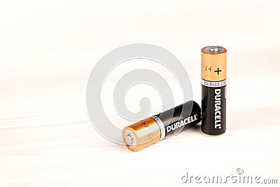 Duracell batteries on white background. Duracell is an American brand of batteries and smart power solutions manufactured by Editorial Stock Photo