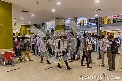 KHARTOUM, SUDAN - MARCH 9, 2019: Long line at the ATM in Al Waha Mall in Khartoum during a monetary crisis in Suda Editorial Stock Photo