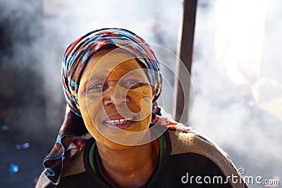 Khayelitsha, South Africa : 16 august 2018 - South African woman with bright face colouring. Editorial Stock Photo