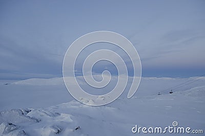 The Khibiny peaks lighted by the sun winter background Stock Photo