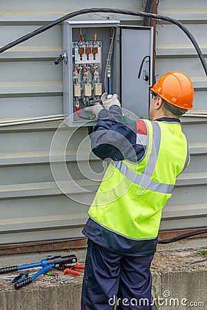 Electrician at the construction Editorial Stock Photo