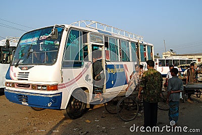 Khulna, Bangladesh: A local bus waiting at the bus terminal at the ferry ghat in Khulna Editorial Stock Photo