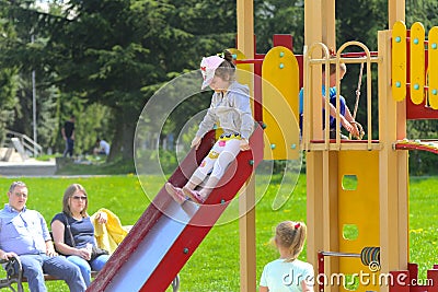 Khust, Ukraine - April 22, 2018. Little children run around and Editorial Stock Photo