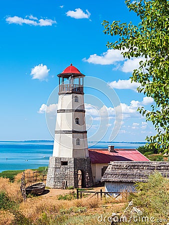 Khutor Merzhanovo, Rostov region, Russia - August 3, 2020: lighthouse on the shore of the Sea of Azov Editorial Stock Photo