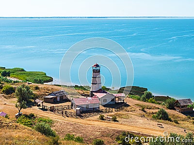 Khutor Merzhanovo, Rostov region, Russia - August 3, 2020: lighthouse on the shore of the Sea of Azov Editorial Stock Photo
