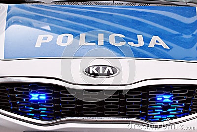 Kia Seed polish police car at the city street. Editorial Stock Photo