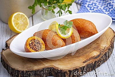 Kibbeh is a popular dish in Middle Eastern cuisine (Turkish name icli kofte Stock Photo