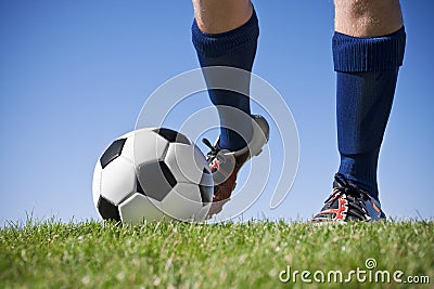 Kicking the soccer ball Stock Photo