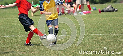 Kicking Soccer Ball on Field 2 Stock Photo