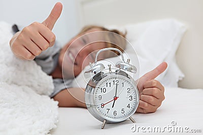 Kid with alarm clock Stock Photo