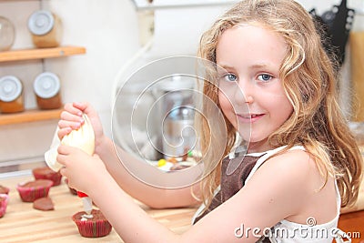 Kid baking or cooking Stock Photo