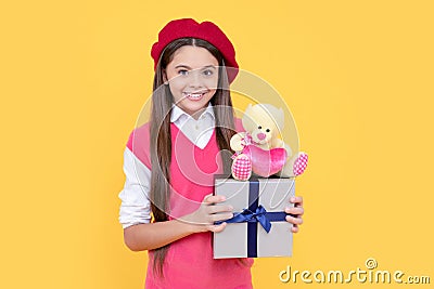 kid in beret with toy. smiling child has birthday. teenage beauty go shopping. Stock Photo