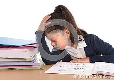 Kid bored under stress with a tired face expression in hate homework concept Stock Photo