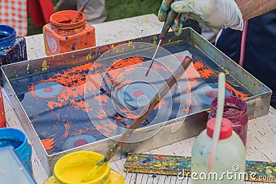 Kid child learning the turkish water painting named Stock Photo