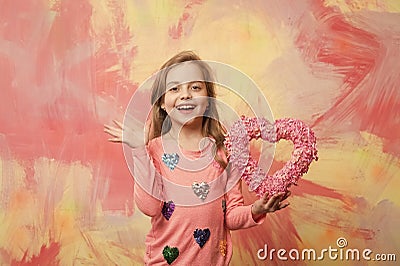 Kid with decorative love heart. Stock Photo