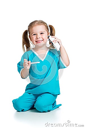 Kid dressed as doctor measuring temperature Stock Photo