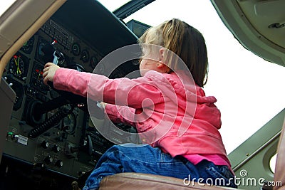 Kid flying the plane Stock Photo