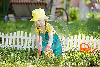 Kid gardening and watering Stock Photo