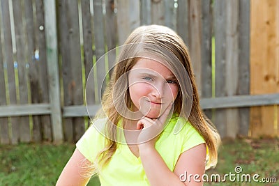 Kid girl with disappoint expression finger thinking Stock Photo