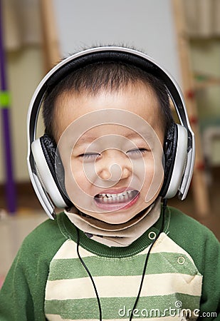 Kid with headphone Stock Photo