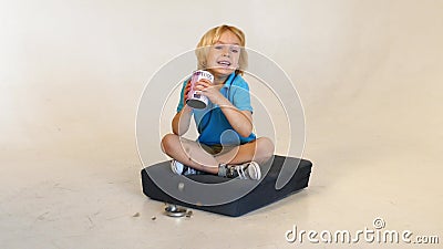 Kid with his piggy bank stock footage Kid with his piggy bank stock footage
