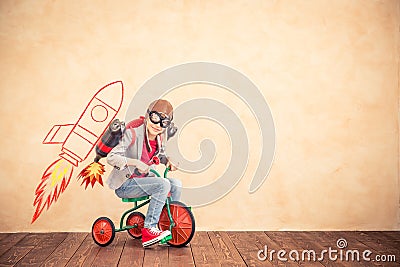 Kid with jet pack at home Stock Photo