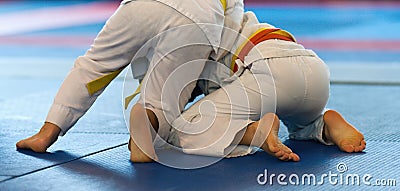 Kid judo, childrens martial art in hall competition at judo school Stock Photo