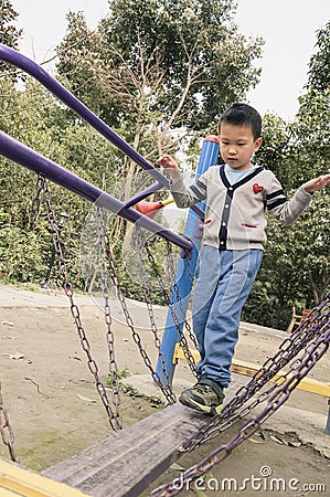 Kid keeping balance Stock Photo