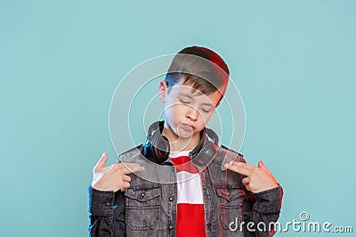 Kid listening music headphones. Music beat concept. Entertainment and fun. Child or teen enjoy music Stock Photo