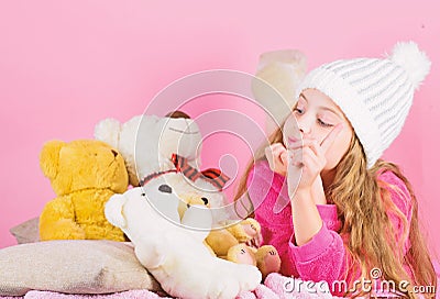 Kid little girl play with soft toy teddy bear pink background. Bears toys collection. Teddy bears improve psychological Stock Photo