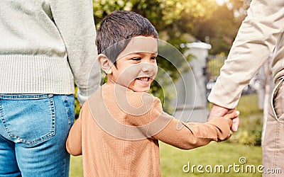 Kid, park walk and holding hands with parents on vacation, adventure or freedom in nature together. Young boy child Stock Photo