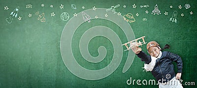 Kid in pilot costume and imagination dream in learning inspiration world in innovative STEM education Stock Photo